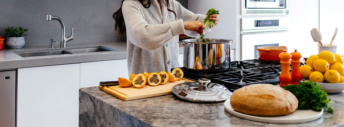 Woman Cooking in Kitchen